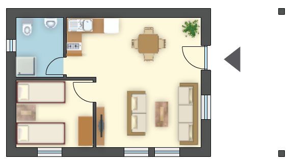 Projekt domku letniskowego na małą działkę, salon z aneksem kuchennym 25 m²